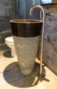 Wash basin with stone inside bathroom